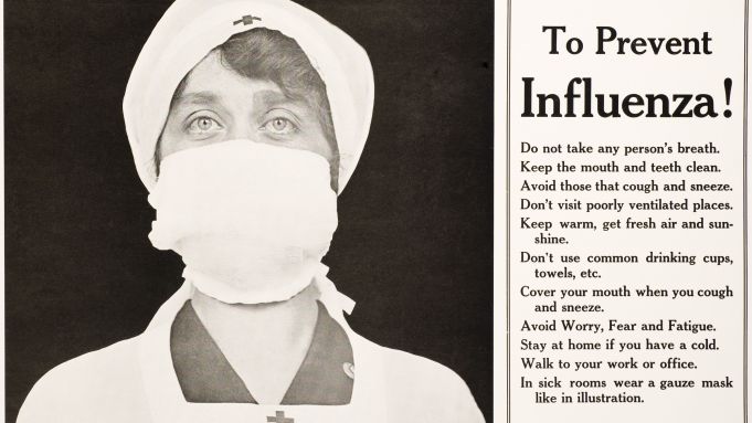 Spanish Flu Epidemic 1918-1919 in America. TO PREVENT INFLUENZA, a Red Cross nurse is pictured with
